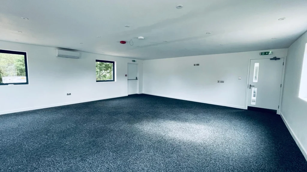 Finished white interior of a modular office room